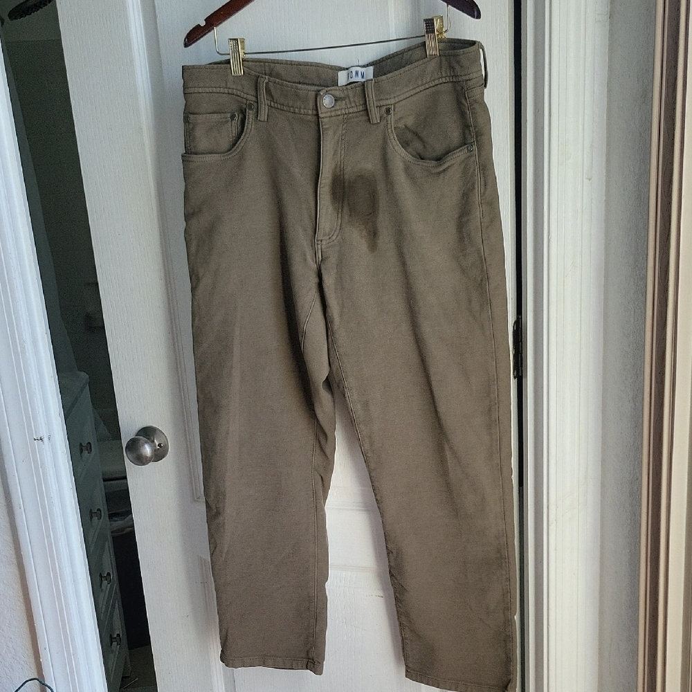 ROWM classic five-pocket 38 x 30 pants in olive green. Straight leg silhouette.